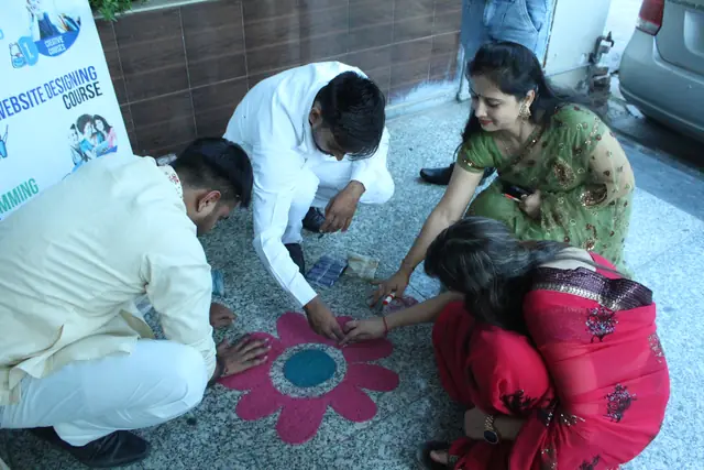 Making the Diwali rangoli together