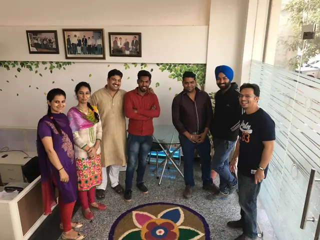 Diwali rangoli and the team at reception