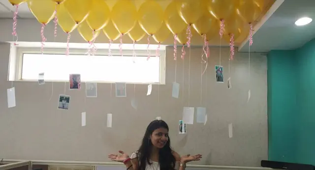 Birthday surprise with balloons and photo memories