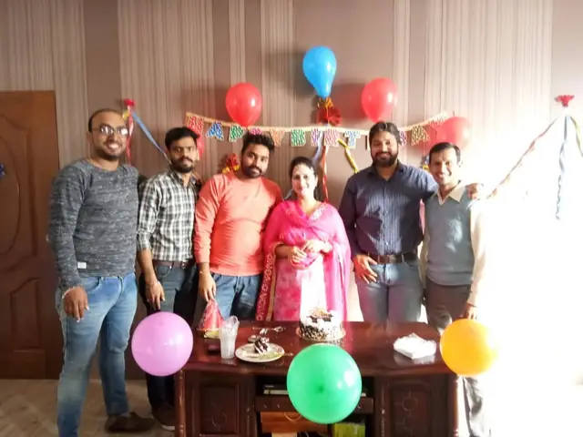 Birthday balloons and cake