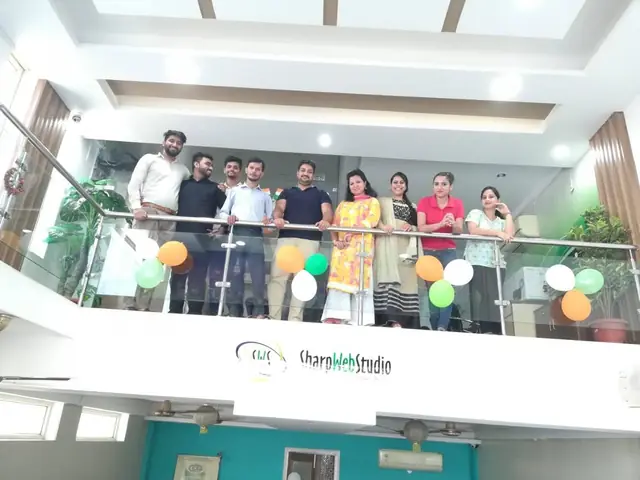 The team on the atrium balcony