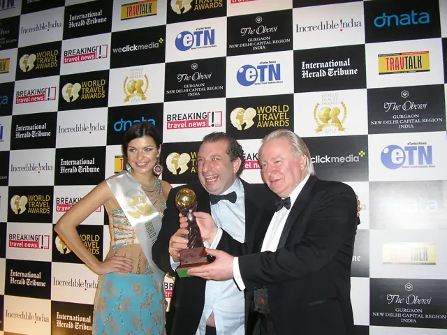 World's Leading Travel Rewards Programme, trophy in hand